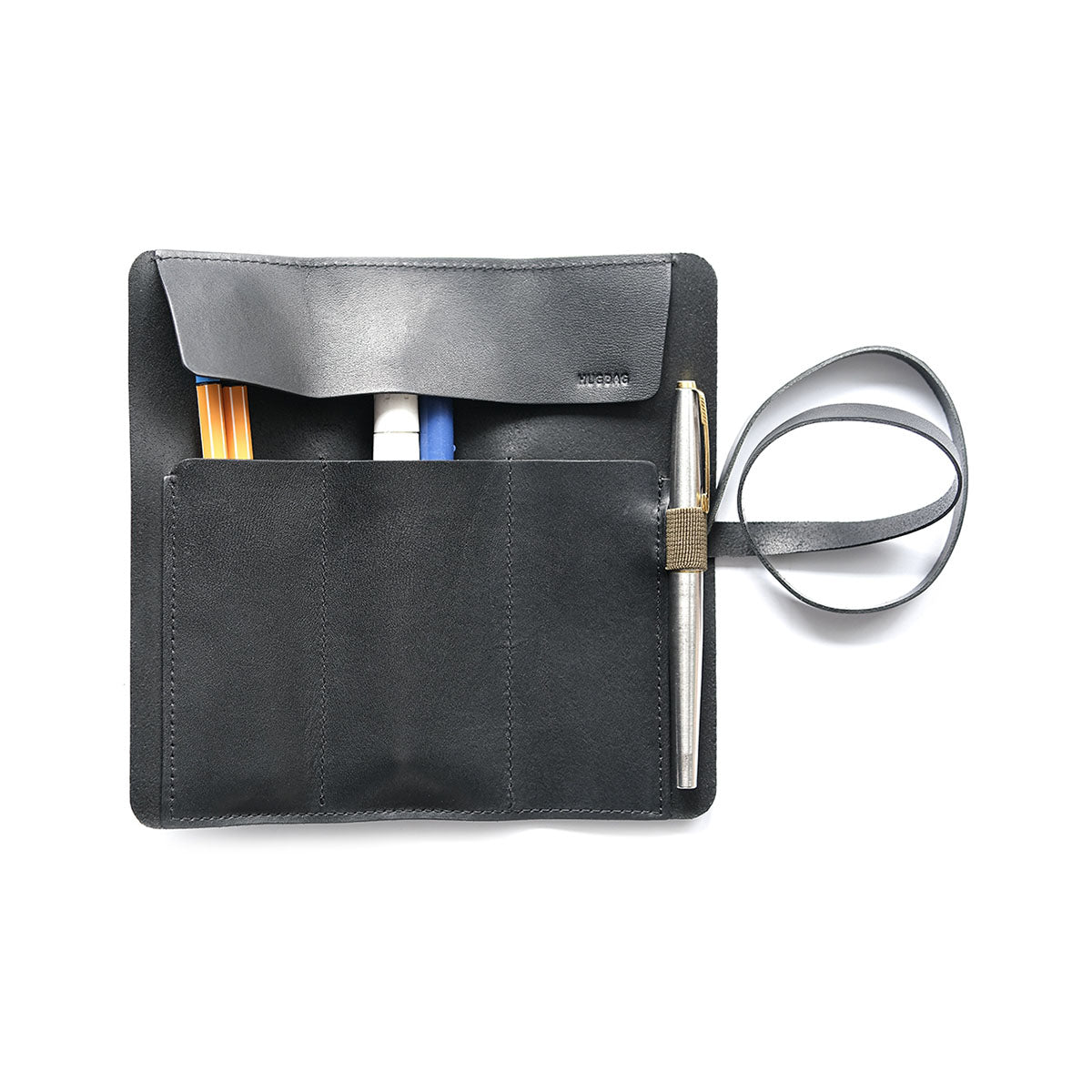 Skórzany piórnik rolowany – czarny, HUGBAG, papierniczy design